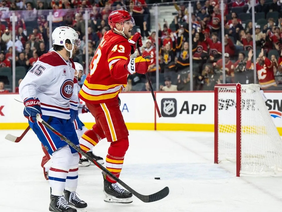  Adam Klapka of the Calgary Flames celebrates after scoring on the Montreal Canadiens during the third period at the Scotiabank Saddledome on Oct. 22, 2025 in Calgary.
