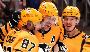 Penguins win entertaining opener over Islanders; Malkin rolling