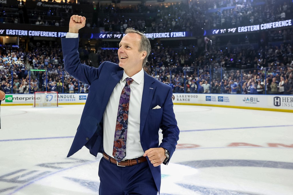 Jon Cooper celebrating after a win over the Florida Panthers after Game Four of the Second Round of the 2022 Stanley Cup Playoffs.