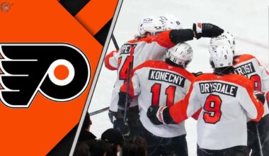 The Philadelphia Flyers team celebrating a goal on the ice, showcasing their teamwork and determination.