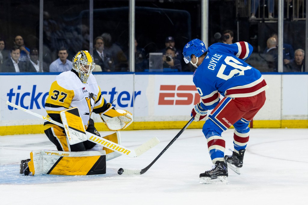 New York Rangers left wing Will Cuylle (50) pressures Pittsburgh Penguins goaltender Arturs Silovs (37) in the first period.