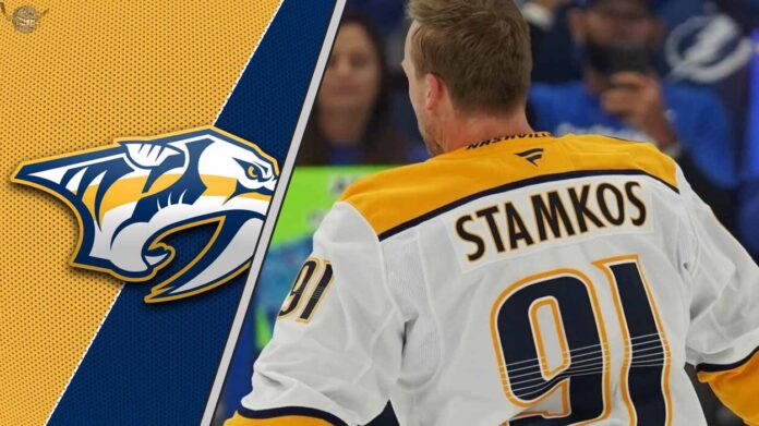 A focused Steven Stamkos skating in his Nashville Predators uniform during a game.