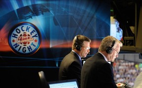 Craig Simpson (left) and Jim Hughson (right) of the Hockey Night in Canada broadcast crew work Game 5 in the Western Conference Finals of the 2011 NHL Stanley Cup Playoffs at Rogers Arena on May 24, 2011.