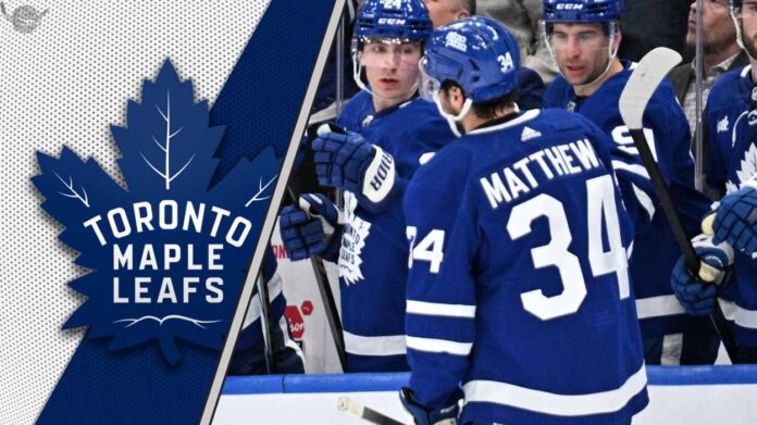 Auston Matthews celebrating a goal as he wonders what next moves the Toronto Maple Leafs will make?