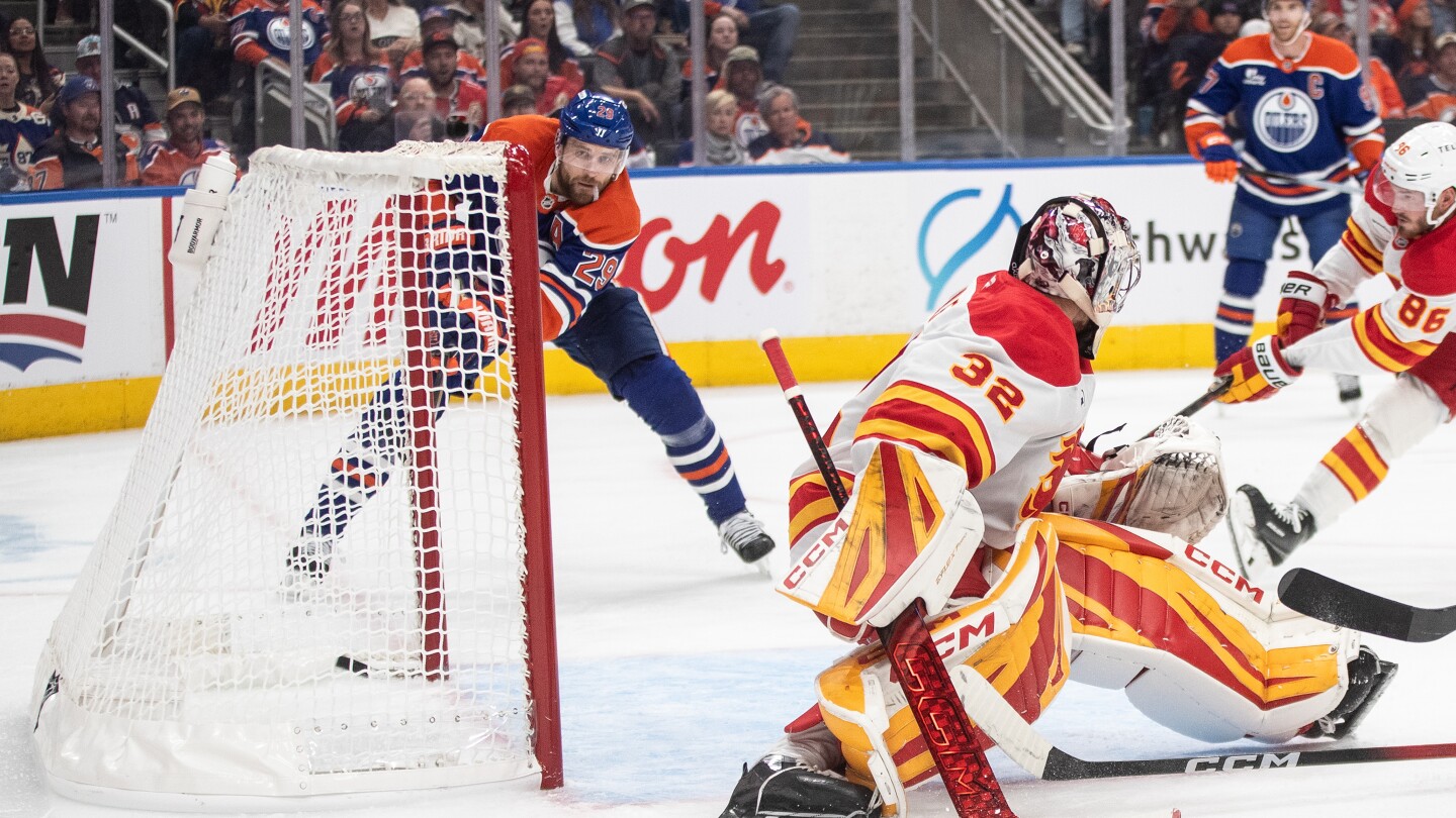 Leon Draisaitl scores his 400th NHL goal in the Oilers' opening shootout loss to the Flames