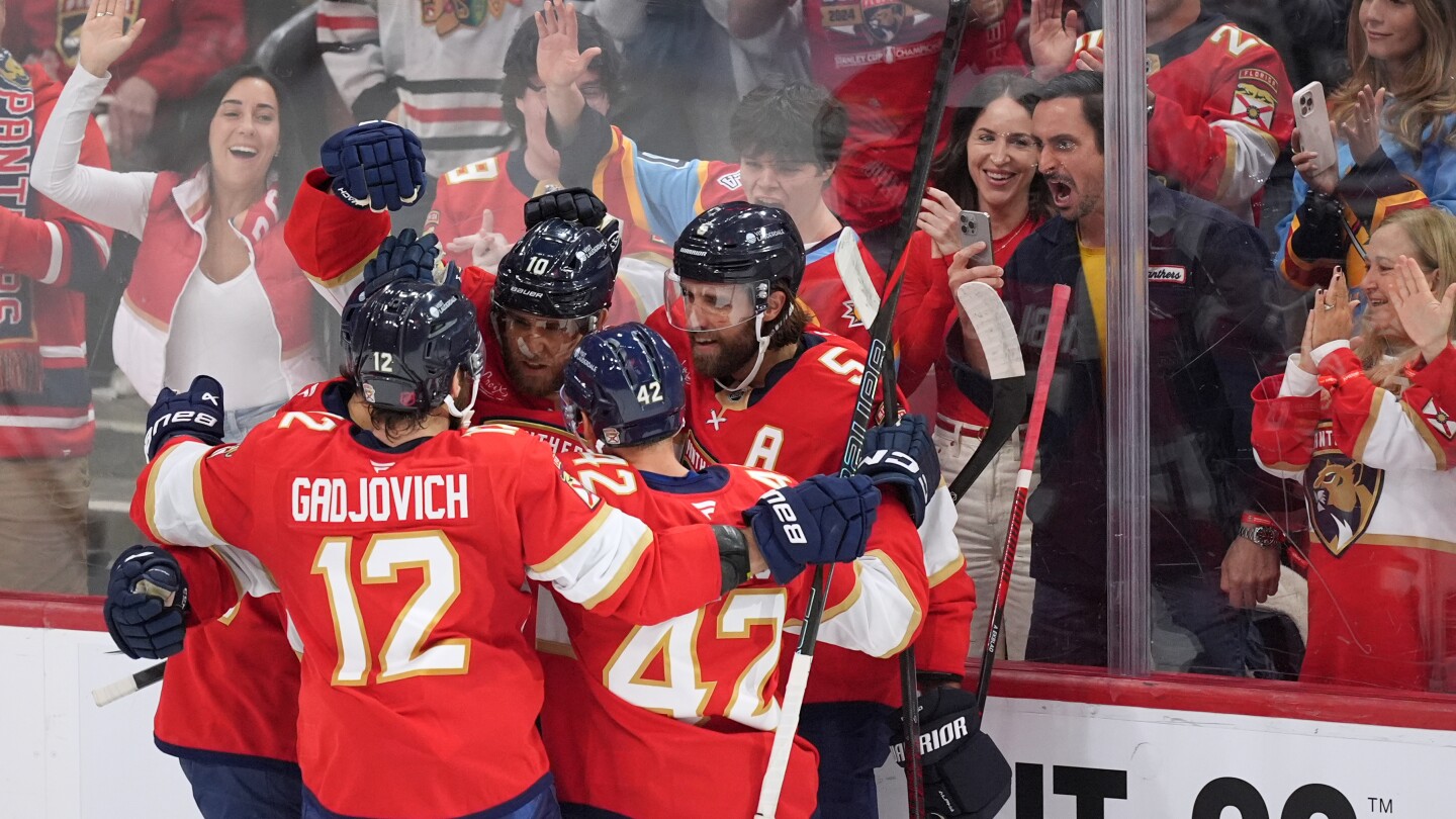 Florida Panthers raise Stanley Cup banner, defeat Blackhawks in opener