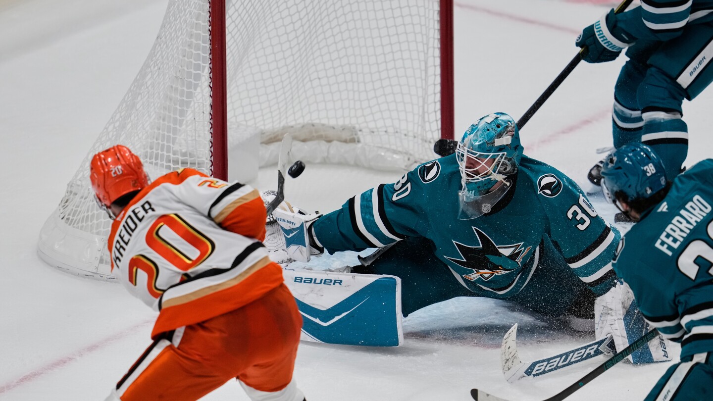 Ducks rally to stun Sharks 7-6 in OT