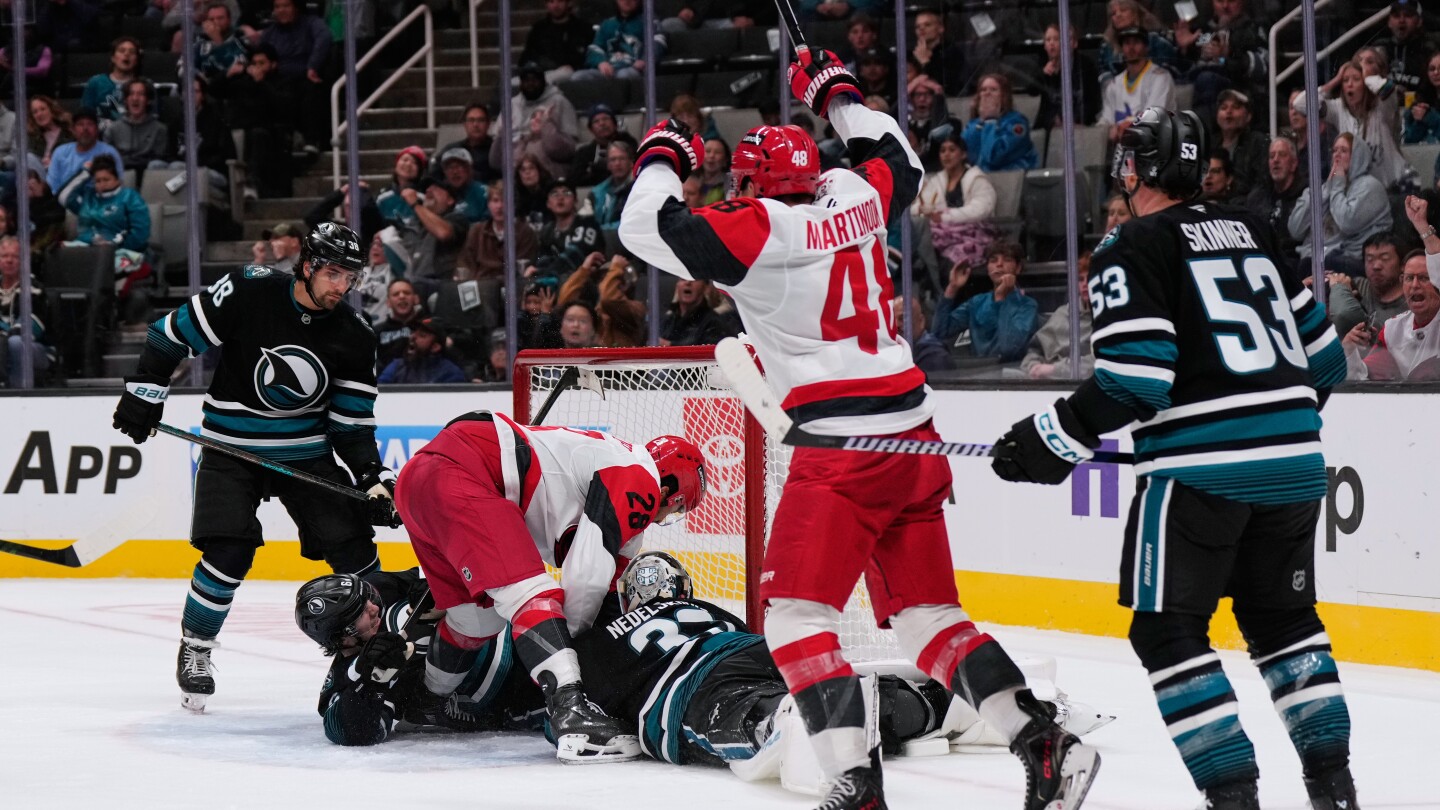 William Carrier, Eric Robinson score late in 2nd period, Hurricanes beat Sharks 5-1 to go to 3-0