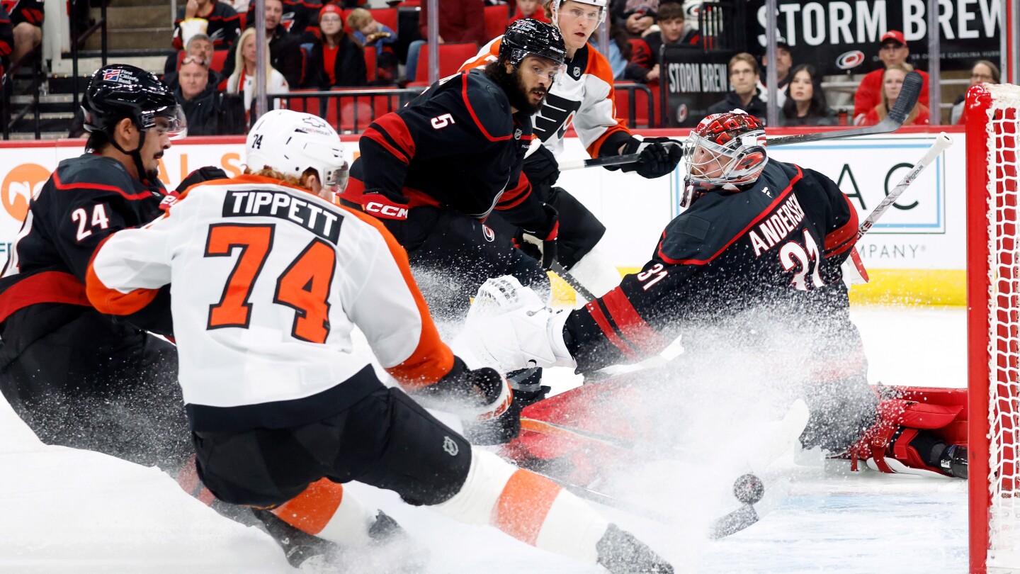 Jarvis scores winner late in OT and Hurricanes top Flyers 4-3