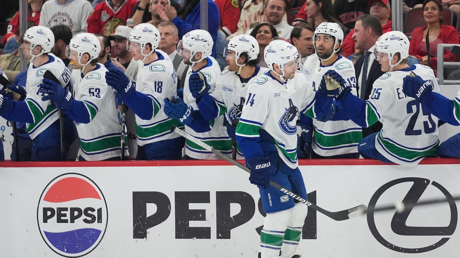 Boeser scores in 4th round of shootout to lift Canucks to 3-2 win over Blackhawks