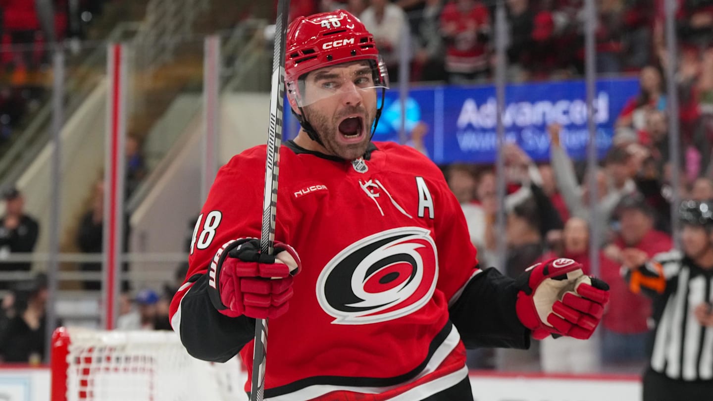 Oct 30, 2025; Raleigh, North Carolina, USA;  Carolina Hurricanes left wing Jordan Martinook (48) celebrates his goal against the New York Islanders during the first period at Lenovo Center. Mandatory Credit: James Guillory-Imagn Images