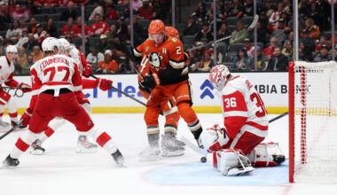 Oct 31, 2025; Anaheim, California, USA;  Detroit Red Wings goaltender John Gibson (36) blocks a shot by Anaheim Ducks defenseman Jackson Lacombe (2) during the second period at Honda Center. Mandatory Credit: Kiyoshi Mio-Imagn Images