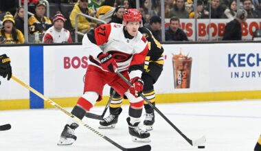 Nov 1, 2025; Boston, Massachusetts, USA; Carolina Hurricanes left wing Nikolaj Ehlers (27) looks to pass the puck during the second period against the Boston Bruins at TD Garden. Mandatory Credit: Eric Canha-Imagn Images