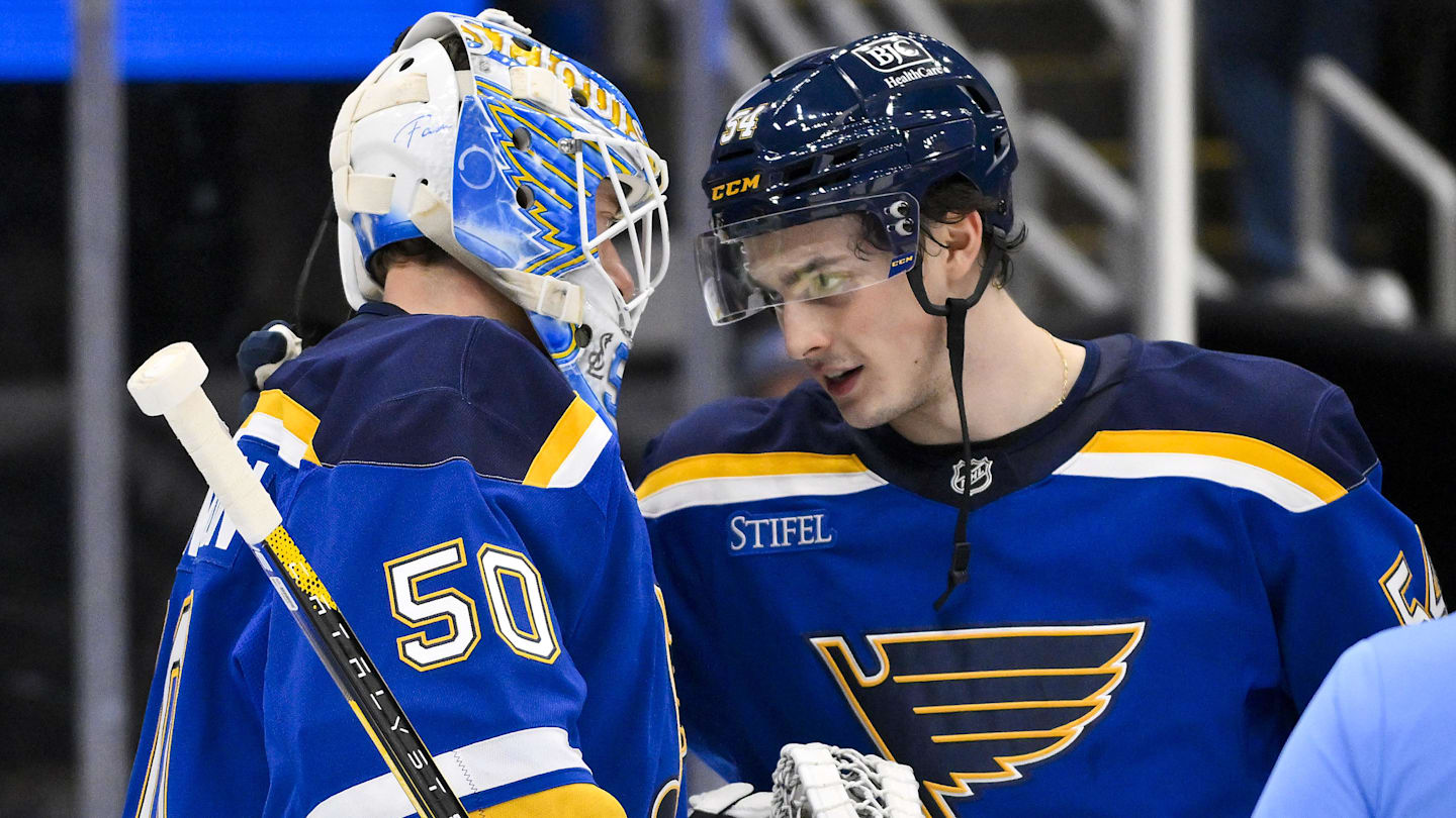 Nov 3, 2025; St. Louis, Missouri, USA; St. Louis Blues right wing Dalibor Dvorsky (54) celebrates with goaltender Jordan Binnington (50) after the Blues defeated the Edmonton Oilers at Enterprise Center. Mandatory Credit: Jeff Curry-Imagn Images