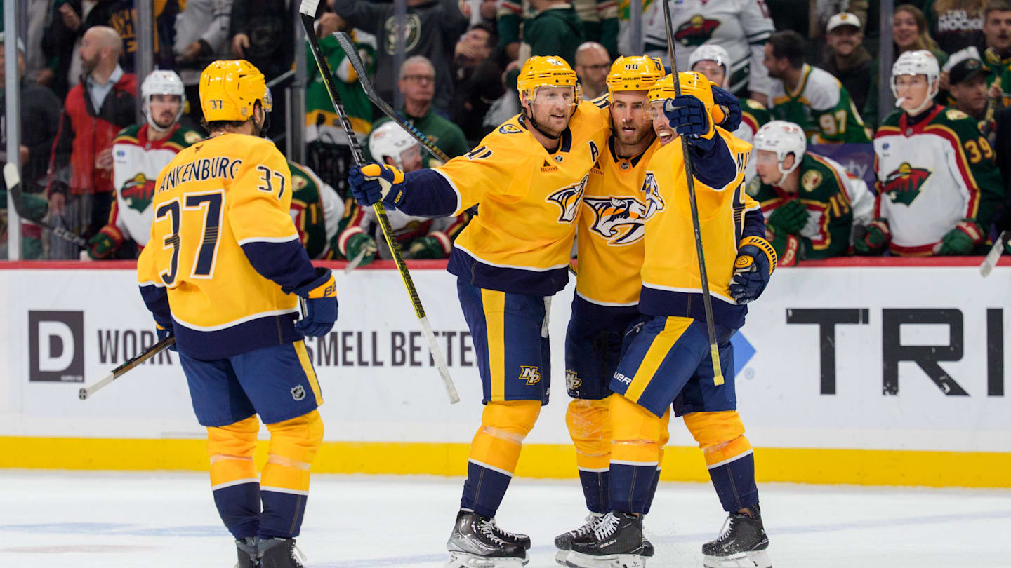 Nov 4, 2025; Saint Paul, Minnesota, USA; Nashville Predators center Steven Stamkos (91) celebrates with teammates after scoring on the Minnesota Wild with just 0.3 seconds left in the third period at Grand Casino Arena. Mandatory Credit: Matt Blewett-Imagn Images