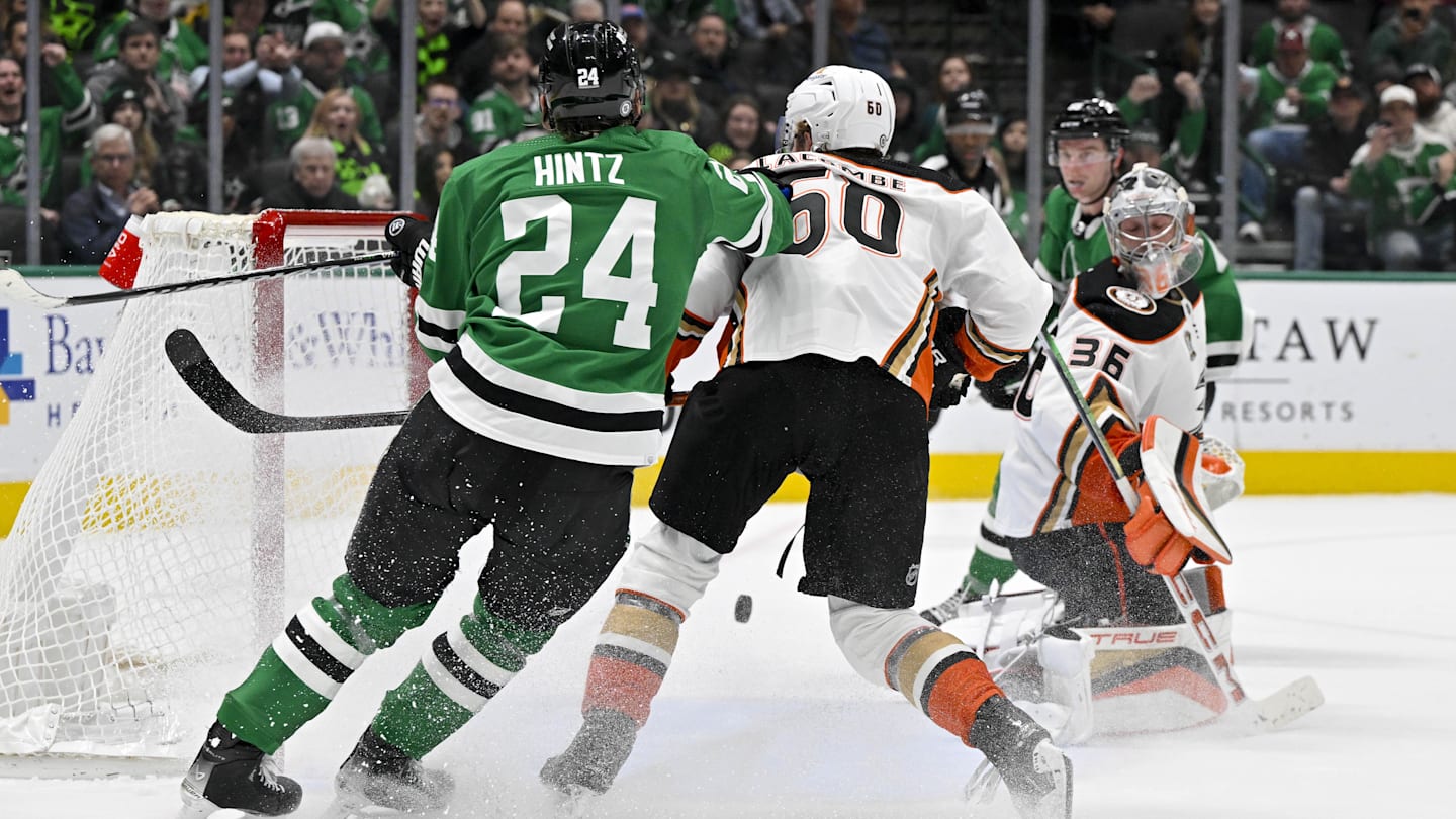 Jan 25, 2024; Dallas, Texas, USA; Dallas Stars defenseman Thomas Harley (55) scores the game winning goal past Anaheim Ducks goaltender John Gibson (36) as Ducks defenseman Jackson LaCombe (60) and Stars center Roope Hintz (24) look on during the overtime period at the American Airlines Center. Mandatory Credit: Jerome Miron-Imagn Images