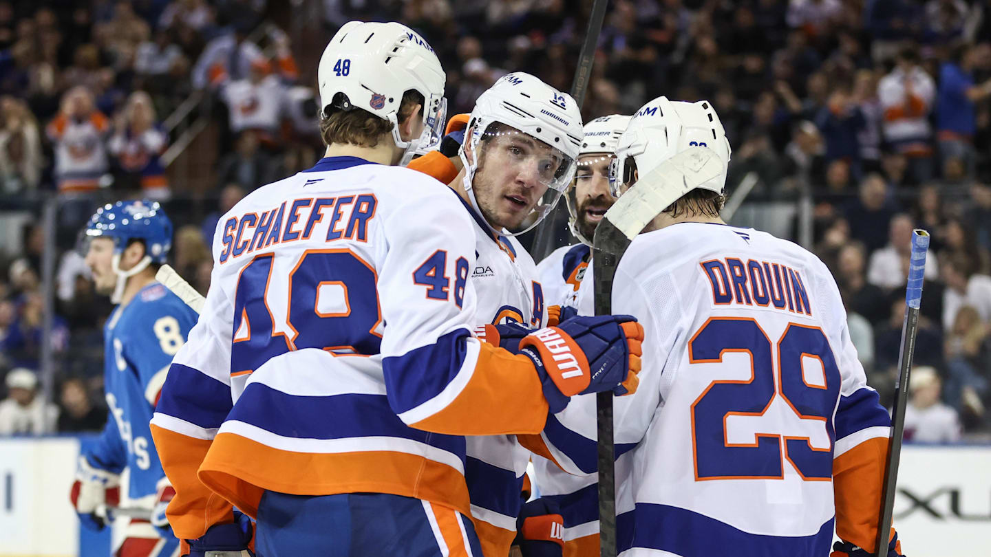 Nov 8, 2025; New York, New York, USA;  New York Islanders center Bo Horvat (14) celebrates with his teammates after his second goal of the game in the second period against the New York Rangers at Madison Square Garden. Mandatory Credit: Wendell Cruz-Imagn Images