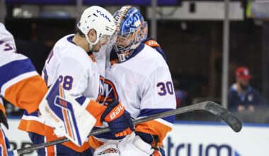Nov 8, 2025; New York, New York, USA;  New York Islanders goaltender Ilya Sorokin (30) celebrates with defenseman Alexander Romanov (28) after defeating the New York Rangers 5-0 at Madison Square Garden. Mandatory Credit: Wendell Cruz-Imagn Images