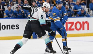 Nov 8, 2025; St. Louis, Missouri, USA; Seattle Kraken defenseman Adam Larsson (6) and St. Louis Blues right wing Jordan Kyrou (25) battle for the puck in the second period at Enterprise Center. Mandatory Credit: Joe Puetz-Imagn Images