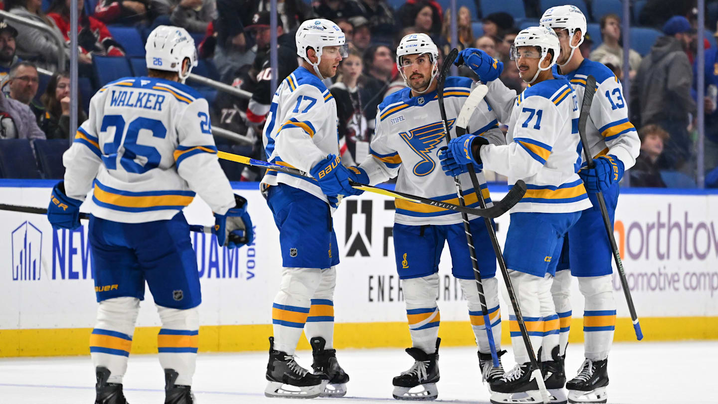 The 4th line celebrating a goal from defenseman Justin Faulk