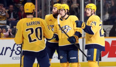 Nov 8, 2025; Nashville, Tennessee, USA; Nashville Predators players celebrate a first period goal against the Dallas Stars by Nashville Predators right wing Luke Evangelista (77) at Bridgestone Arena. Mandatory Credit: Alan Poizner-Imagn Images