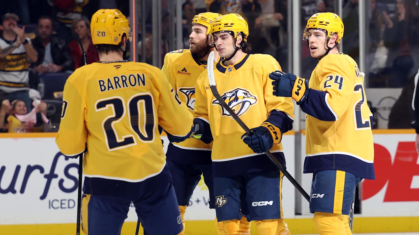 Nov 8, 2025; Nashville, Tennessee, USA; Nashville Predators players celebrate a first period goal against the Dallas Stars by Nashville Predators right wing Luke Evangelista (77) at Bridgestone Arena. Mandatory Credit: Alan Poizner-Imagn Images