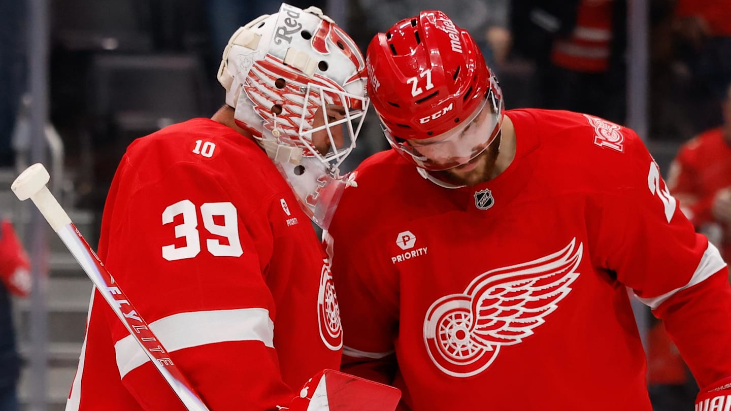 Nov 13, 2025; Detroit, Michigan, USA;  Detroit Red Wings goaltender Cam Talbot (39) and center Michael Rasmussen (27) celebrate after defeating the Anaheim Ducks at Little Caesars Arena. Mandatory Credit: Rick Osentoski-Imagn Images