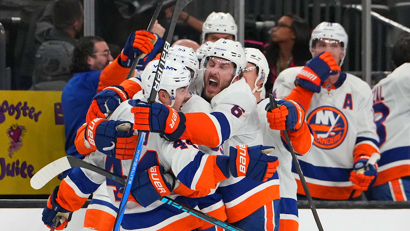 Nov 13, 2025; Las Vegas, Nevada, USA; New York Islanders center Jean-Gabriel Pageau (44) celebrates with team mates after scoring a short-handed goal against the Vegas Golden Knights during an overtime period to give the Islanders a 4-3 victory at T-Mobile Arena. Mandatory Credit: Stephen R. Sylvanie-Imagn Images