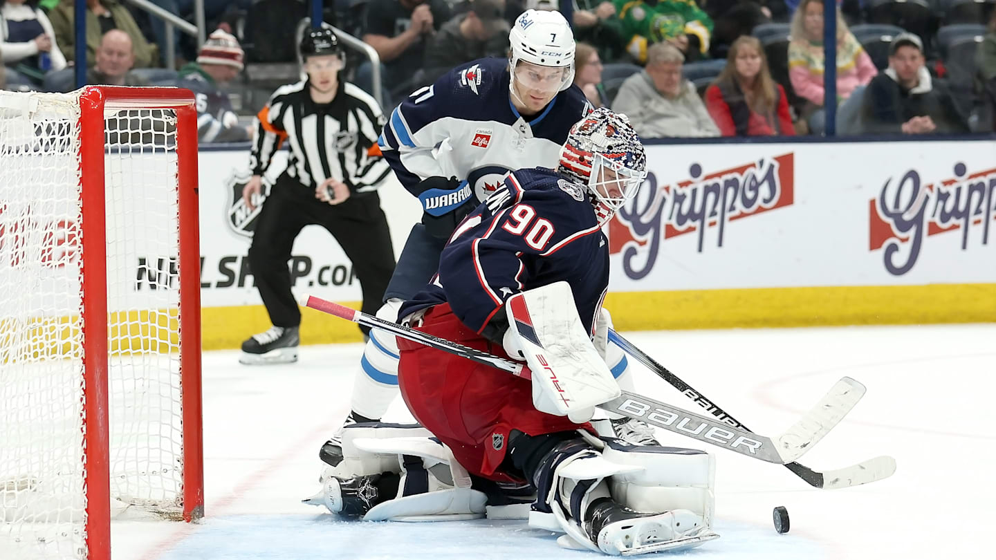 Blue Jackets goaltender Elvis Merzlikins makes a save against the Winnipeg Jets.