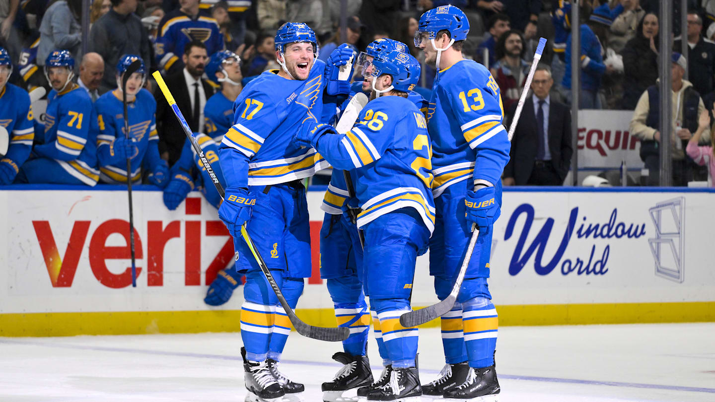Nov 14, 2025; St. Louis, Missouri, USA; St. Louis Blues defenseman Cam Fowler (17) is congratulated by teammates after assisting on a goal by defenseman Justin Faulk (72) for his 500th career point in the NHL during the second period against the Philadelphia Flyers at Enterprise Center. Mandatory Credit: Jeff Curry-Imagn Images