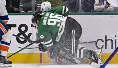 Nov 18, 2025; Dallas, Texas, USA; Dallas Stars right wing Mikko Rantanen (96) is called for a game misconduct penalty for boarding on New York Islanders defenseman Alexander Romanov (28) during the third period at the American Airlines Center. Mandatory Credit: Jerome Miron-Imagn Images
