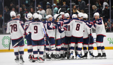 The Columbus Blue Jackets celebrate after defeating the Seattle Kraken during a shootout at Climate Pledge Arena