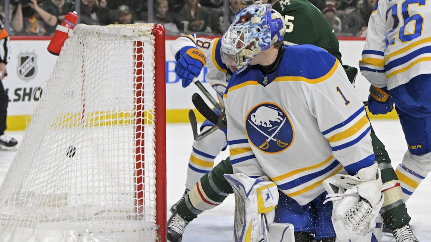 Mar 22, 2025; Saint Paul, Minnesota, USA;  Minnesota Wild forward Justin Brazeau (15) gets behind Buffalo Sabres goalie Ukko-Pekka Luukkonen (1) to score a goal as defenseman Rasmus Dahlin (26) defends during the second period at Xcel Energy Center. Mandatory Credit: Nick Wosika-Imagn Images
