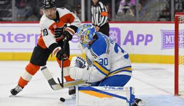 Nov 20, 2025; Philadelphia, Pennsylvania, USA; Philadelphia Flyers right wing Bobby Brink (10) reaches for the puck as St. Louis Blues goaltender Joel Hofer (30) makes a save during the first period at Xfinity Mobile Arena. Mandatory Credit: Eric Hartline-Imagn Images