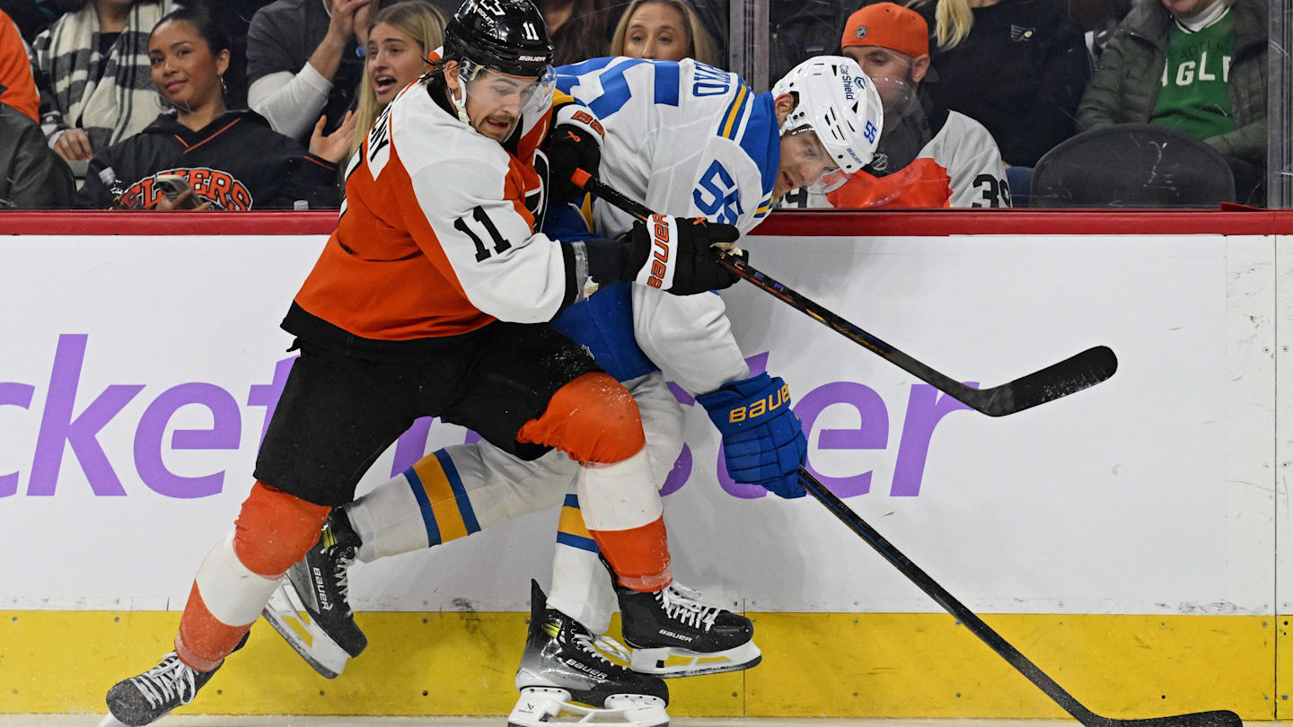 Nov 20, 2025; Philadelphia, Pennsylvania, USA; Philadelphia Flyers right wing Travis Konecny (11) and St. Louis Blues defenseman Colton Parayko (55) during the thord period at Xfinity Mobile Arena. Mandatory Credit: Eric Hartline-Imagn Images