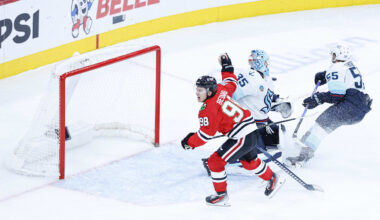 Nov 20, 2025; Chicago, Illinois, USA; Chicago Blackhawks center Connor Bedard (98) reacts to a lack of call against Seattle Kraken defenseman Ryan Lindgren (55) during the third period at United Center. Mandatory Credit: Kamil Krzaczynski-Imagn Images