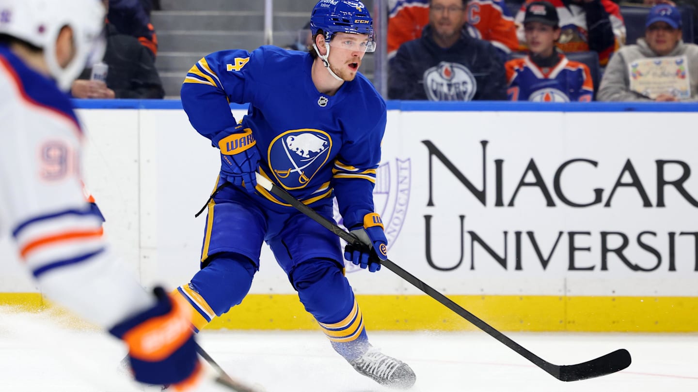 Nov 17, 2025; Buffalo, New York, USA;  Buffalo Sabres defenseman Bowen Byram (4) looks to make a pass during the second period against the Edmonton Oilers at KeyBank Center. Mandatory Credit: Timothy T. Ludwig-Imagn Images