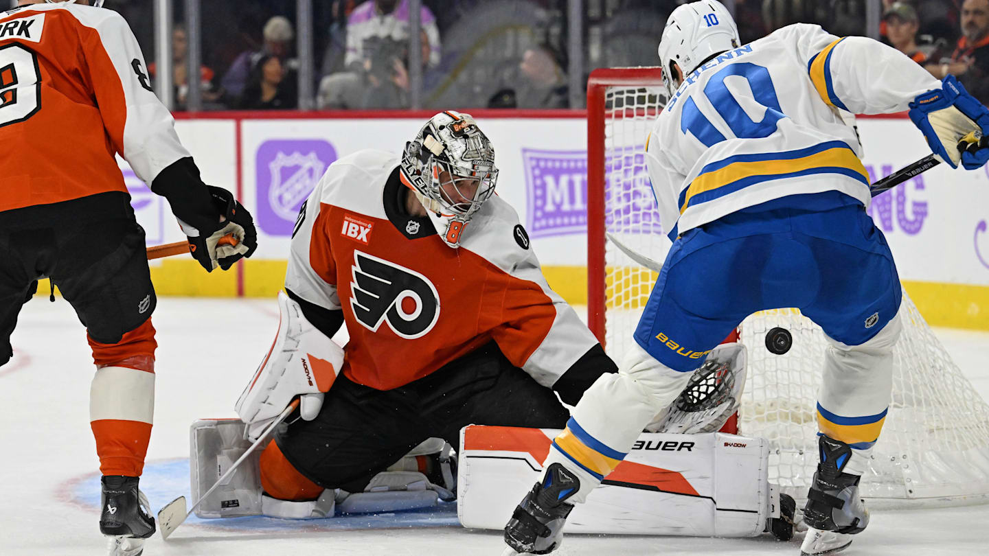 Nov 20, 2025; Philadelphia, Pennsylvania, USA; Philadelphia Flyers goaltender Dan Vladar (80) makes a save against St. Louis Blues center Brayden Schenn (10) during the second period at Xfinity Mobile Arena. Mandatory Credit: Eric Hartline-Imagn Images
