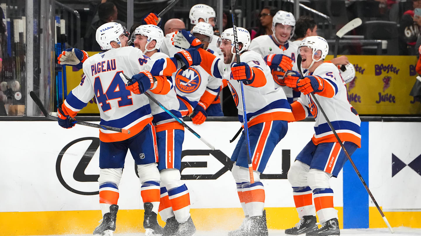 Nov 13, 2025; Las Vegas, Nevada, USA; New York Islanders center Jean-Gabriel Pageau (44) celebrates with team mates after scoring a short-handed goal against the Vegas Golden Knights during an overtime period to give the Islanders a 4-3 victory at T-Mobile Arena. Mandatory Credit: Stephen R. Sylvanie-Imagn Images