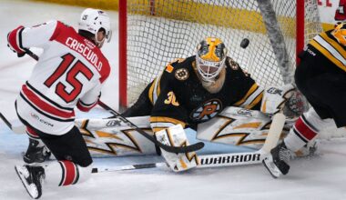 Providence Bruins goalie Michael DiPietro deflects a shot from Charlotte Checkers center Kyle Criscuolo in the second period.