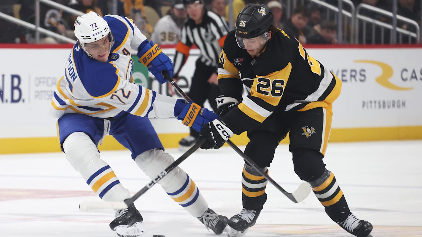 Nov 26, 2025; Pittsburgh, Pennsylvania, USA; Buffalo Sabres center Tage Thompson (72) and Pittsburgh Penguins center Tristan Broz (26) battles for the puck during the second period at PPG Paints Arena. Mandatory Credit: Charles LeClaire-Imagn Images