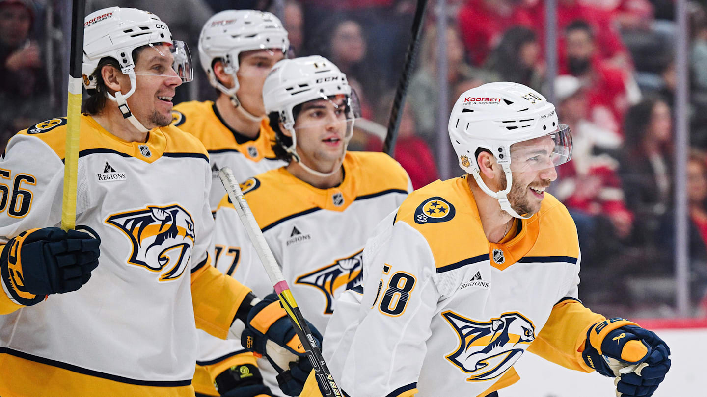 Nov 26, 2025; Detroit, Michigan, USA; Nashville Predators left wing Michael Bunting (58) celebrates his goal with teammates during the first period against the Detroit Red Wings at Little Caesars Arena. Mandatory Credit: Tim Fuller-Imagn Images