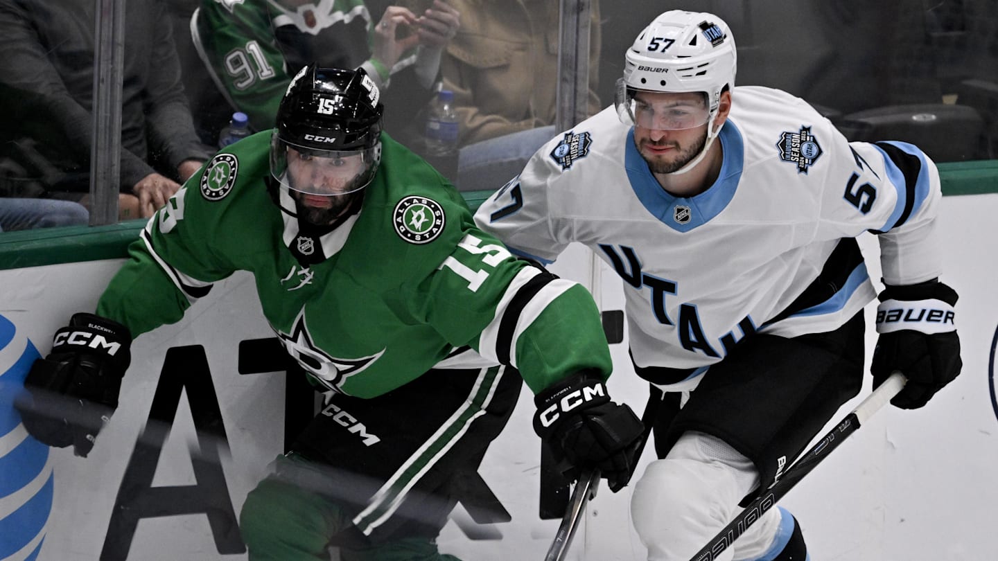 Apr 12, 2025; Dallas, Texas, USA; Dallas Stars center Colin Blackwell (15) and Utah Hockey Club defenseman Nick DeSimone (57) chase the puck lduring the third period at the American Airlines Center. Mandatory Credit: Jerome Miron-Imagn Images