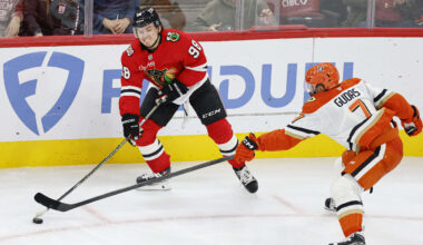 Oct 19, 2025; Chicago, Illinois, USA; Anaheim Ducks defenseman Radko Gudas (7) defends against Chicago Blackhawks center Connor Bedard (98) during the second period at United Center. Mandatory Credit: Kamil Krzaczynski-Imagn Images