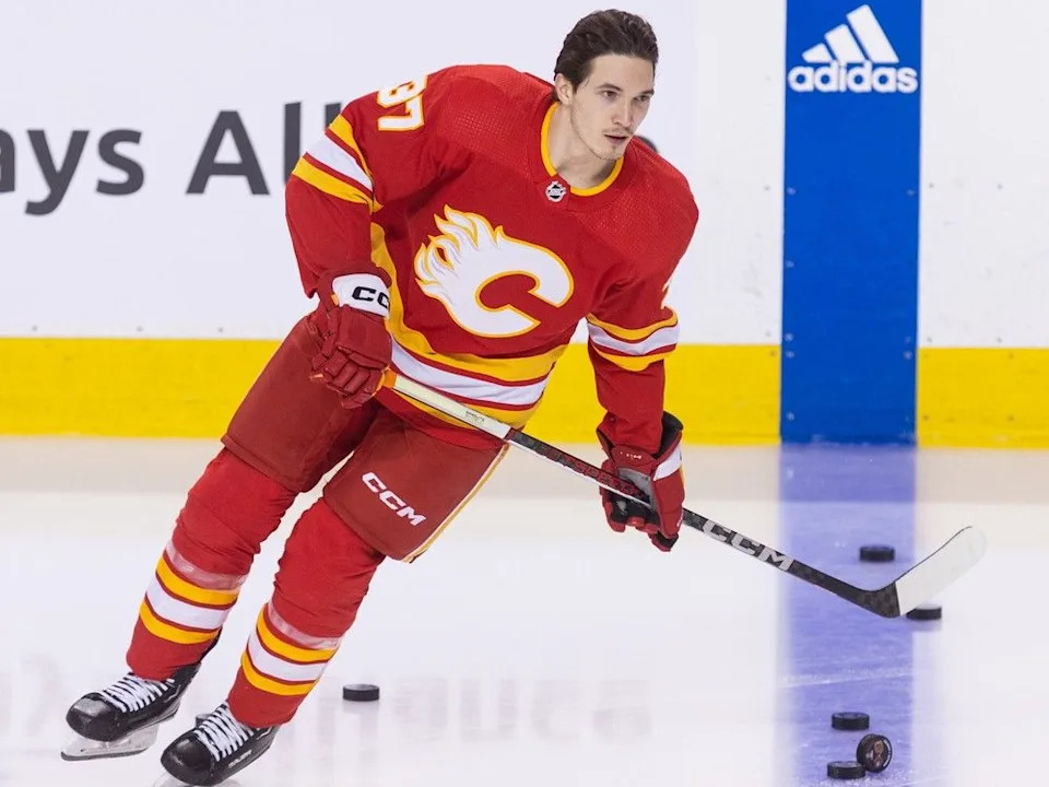  Calgary Flames defenceman Yan Kuznetsov hits the ice during warm-up before a game against the Ottawa Senators at the Scotiabnak Saddledome on Jan. 9, 2024.