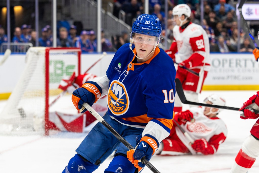 Islanders right wing Simon Holmstrom (10) celebrates his goal during the third period against the Detroit Red Wings at UBS Arena, Thursday, Oct. 23, 2025, in Elmont, NY. 