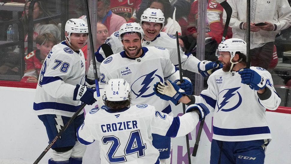 Tampa Bay Lightning center Jack Finley (62) celebrates his goal during the third period of an NHL hockey game against the Florida Panthers, Saturday, Nov. 15, 2025, in Sunrise, Fla. (AP Photo/Marta Lavandier)