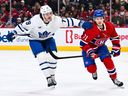 Sammy Blais of the Toronto Maple Leafs skates against Jake Evans of the Montréal Canadiens during a game on Nov. 22, 2025.