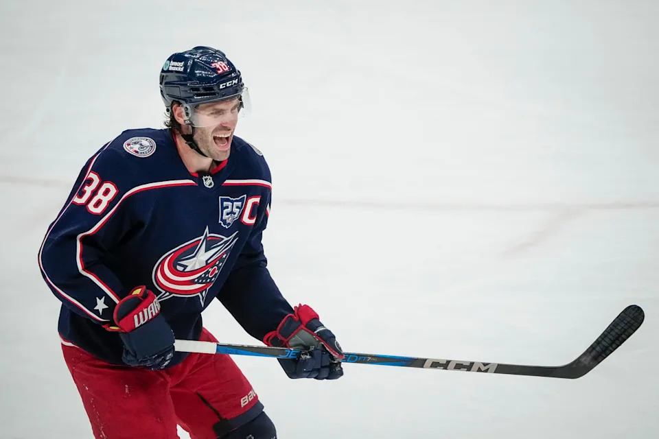 Columbus Blue Jackets center Boone Jenner (38) grimaces after taking a shot to the face during the second period of the NHL hockey game against the St. Louis Blues at Nationwide Arena in Columbus on Nov. 1, 2025.