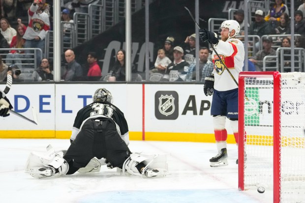Florida Panthers center Sam Bennett, right, celebrates his goal as...